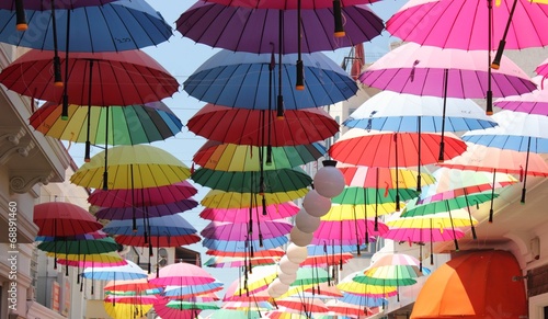 Artistic umbrellas along the streets of fethiye in turkey photo
