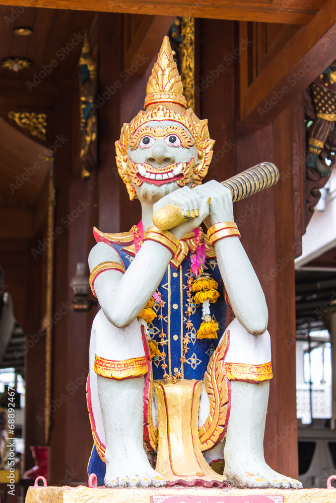 Thai giant statue with teak chapel