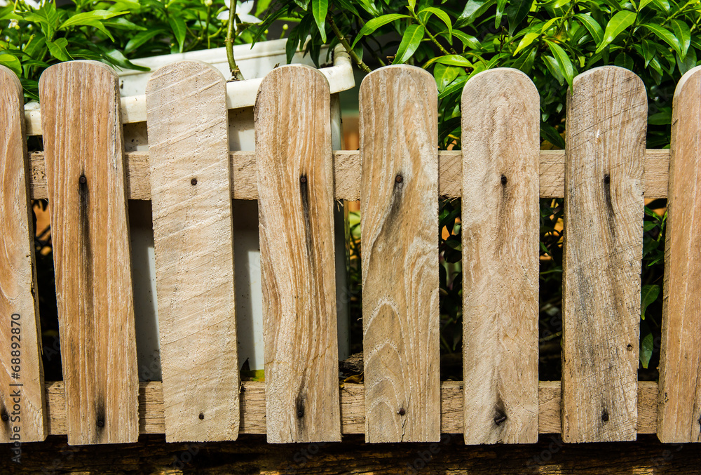 Picket fence with traditional wooden