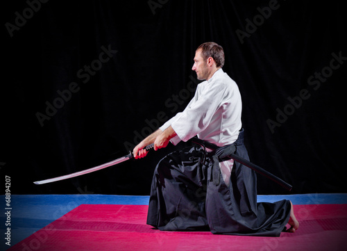Fotografie Martial arts fighter with katana