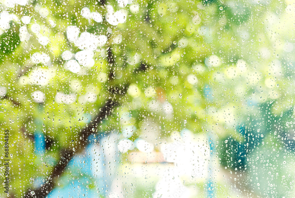 Obraz premium home window with raindrops after summer rain