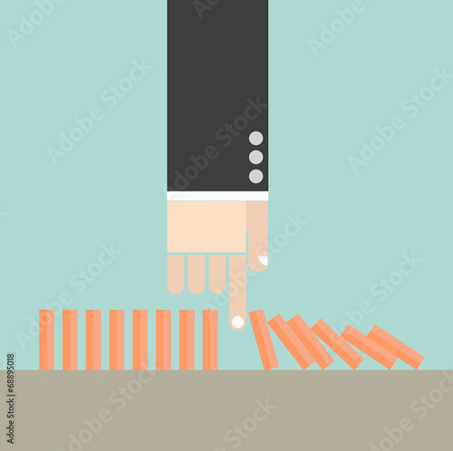 Business concept. Hand break domino crisis conceptuals.
