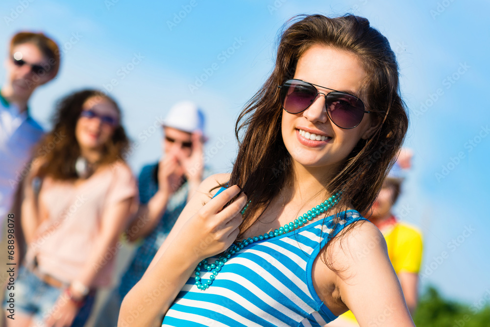 stylish young woman in sunglasses