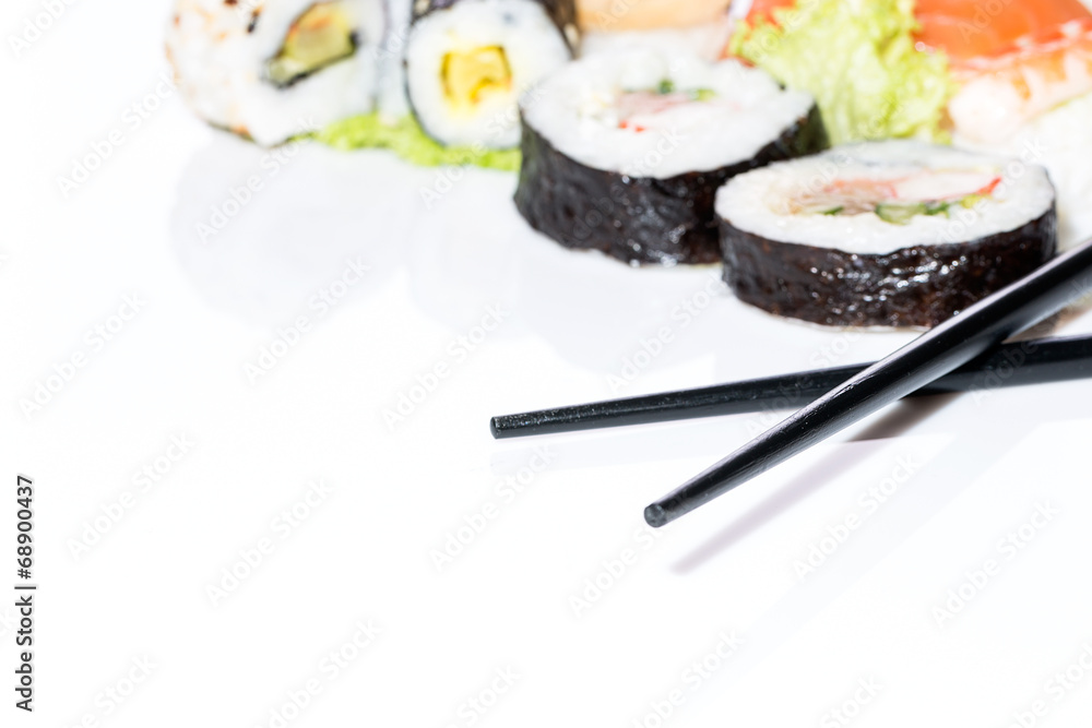 Sushi assortment on white background. Sushi assortment on white background.