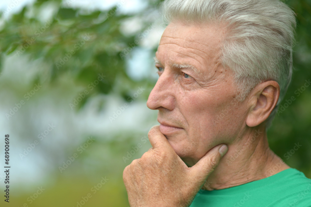 Senior man thinking outddor Senior man thinking outddor