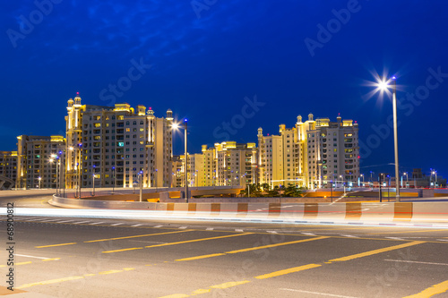 Photography Road to the Palm Jumeirah island in Dubai at night, UAE