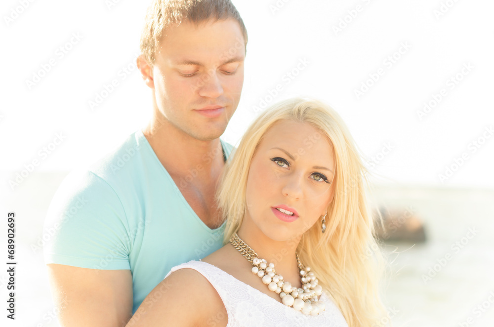 Romantic young couple near the sea. Romantic young couple near the sea.