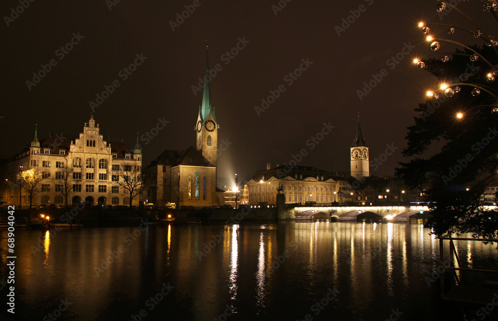 The night view of the Fraumunster church and Zurich downtown