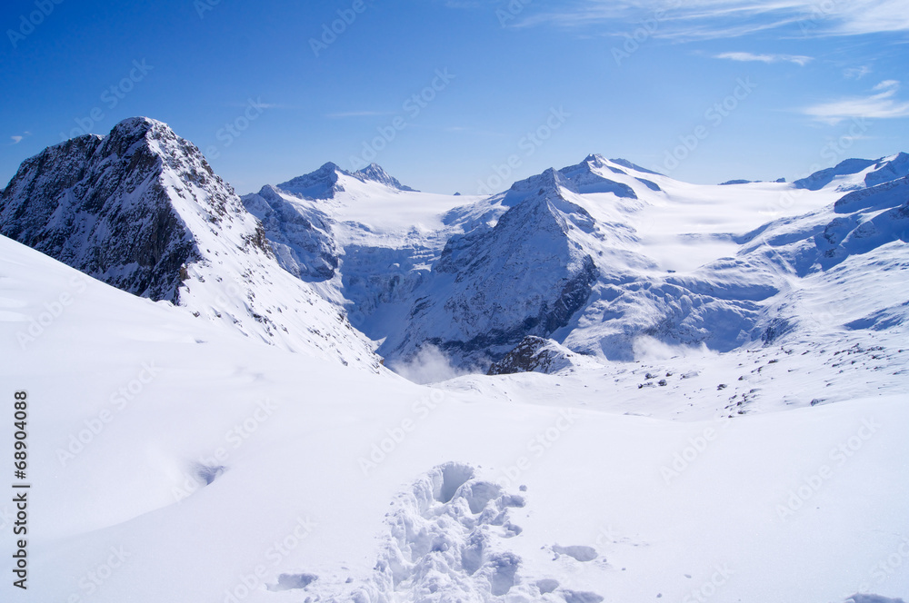 Footprints in snow in Dolomites
