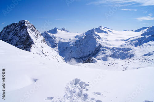 Footprints in snow in Dolomites © jankost