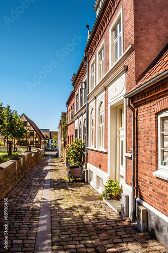 Fototapeta Naklejka Na Ścianę i Meble -  Oldfashioned street architecture with apartments