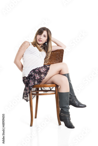 Beautiful Woman Sitting On Chair