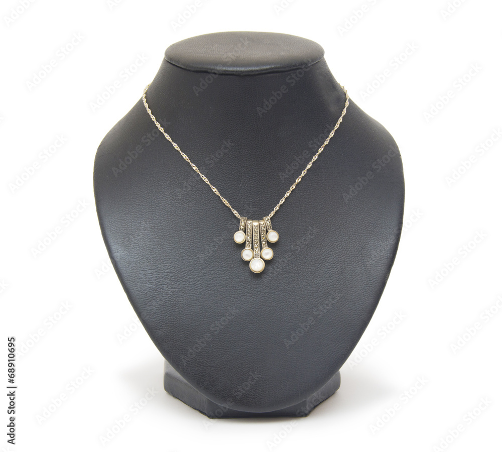 beautiful silver necklace on mannequin isolated on white beautiful silver necklace on mannequin isolated on white
