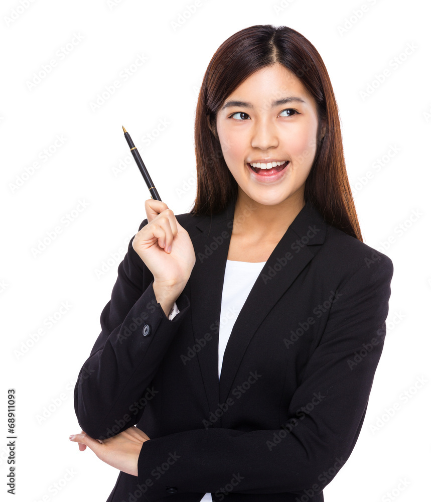 Asian businesswoman hold pen with idea Asian businesswoman hold pen with idea
