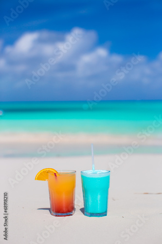 Two tasty cocktails on the white sandy beach