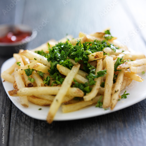 plate of truffle fries with parsley spread