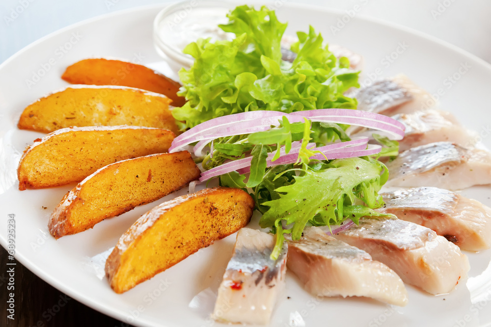 Fried potato with pickled herring Fried potato with pickled herring