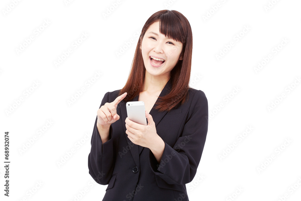 スマートフォンを持って喜ぶビジネスウーマン スマートフォンを持って喜ぶビジネスウーマン