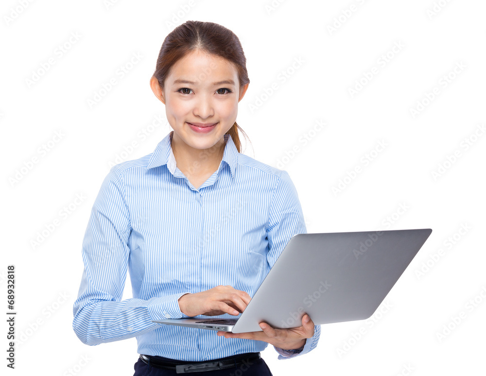 Asian businesswoman use notebook computer Asian businesswoman use notebook computer