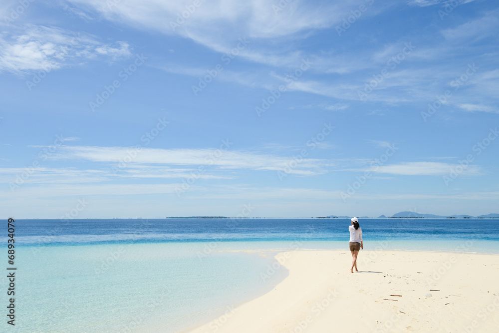 beautiful young girl looking at horizon on tropical beach beautiful young girl looking at horizon on tropical beach