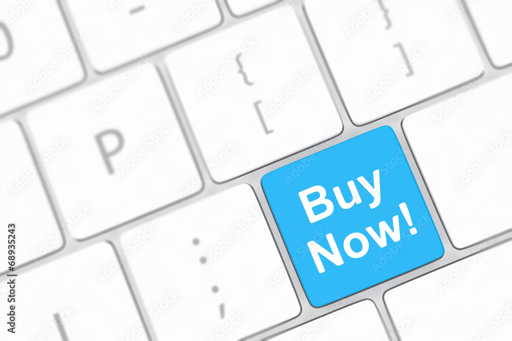 Buy now key on a white keyboard Buy now key on a white keyboard