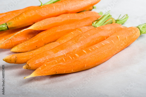 Peeled carrots with stems