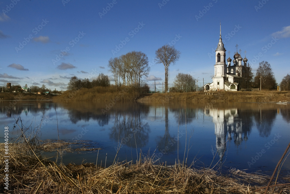 Spring flood church on the bank