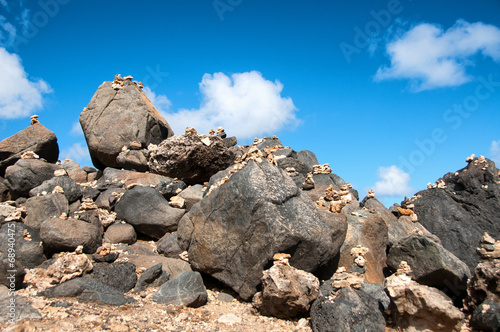 Stone pebbles stacked on the rocks in Aruba