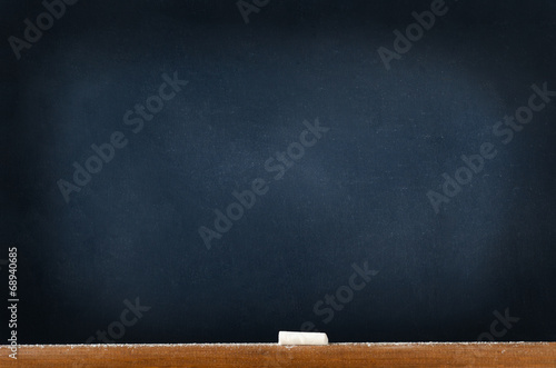 Blackboard with Chalk and Dust
