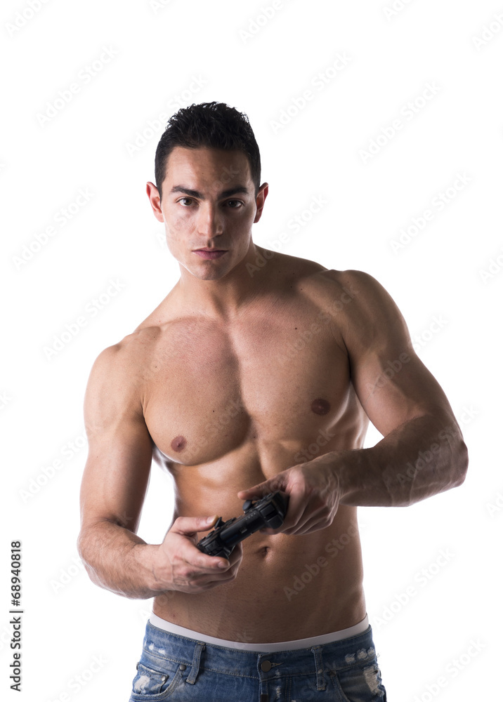 Young man playing a video game with joystick in hands Young man playing a video game with joystick in hands