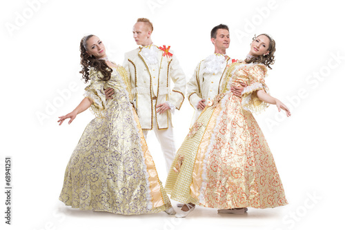 Four girls and boys, dressed in historical aristocrat costumes