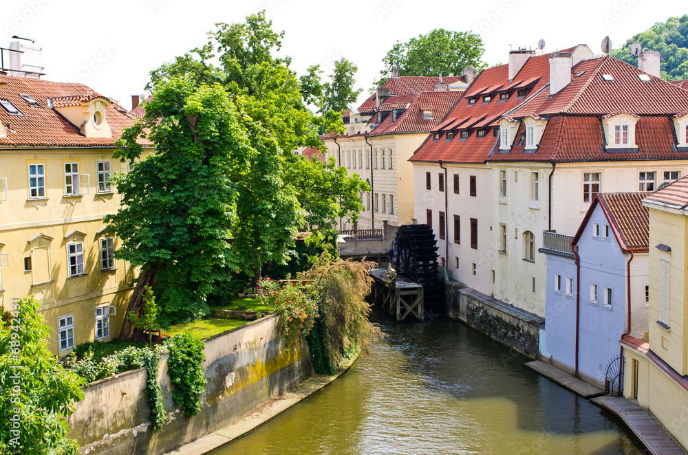Fototapeta premium Water Mill on Vltava river in Prague, Czech Republic
