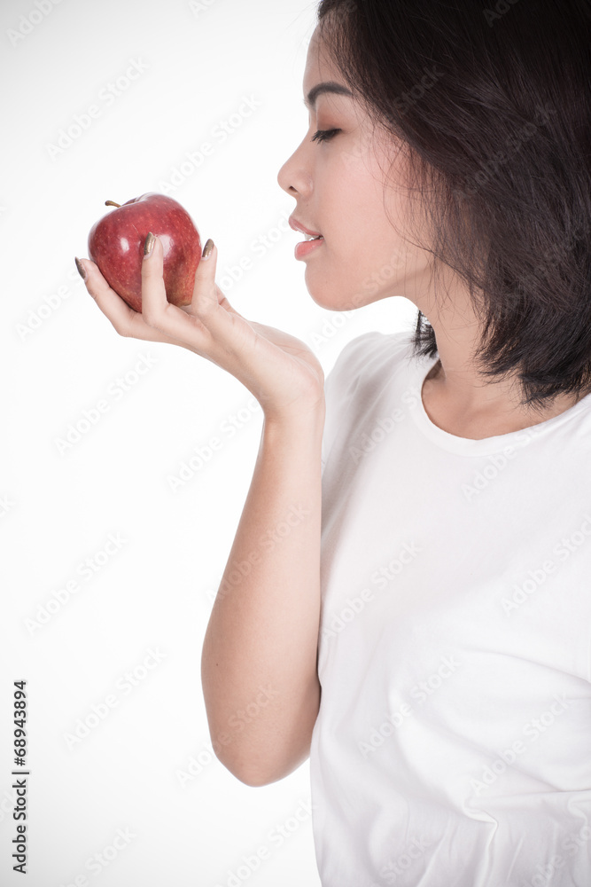 Smiling woman with apple isolated on white Smiling woman with apple isolated on white