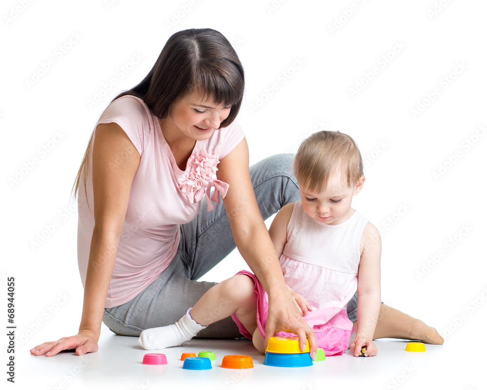 kid girl and mother play together with cup toys kid girl and mother play together with cup toys