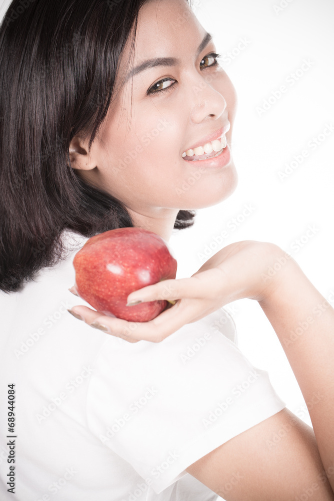 Smiling woman with apple isolated on white Smiling woman with apple isolated on white