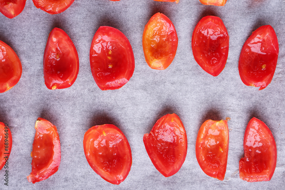 Tomatoes on drying tray, close-up Tomatoes on drying tray, close-up