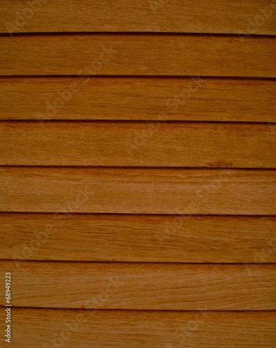 8 braune Holzbalken als Hintergrund