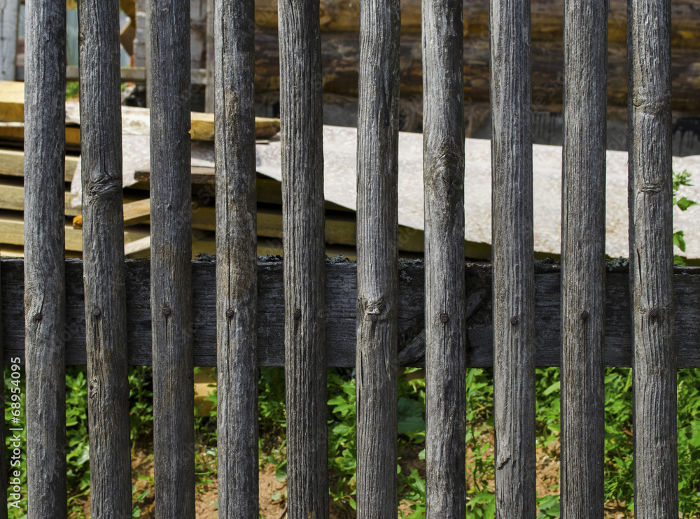 Close details of a fence made from sticks and rope Close details of a fence made from sticks and rope