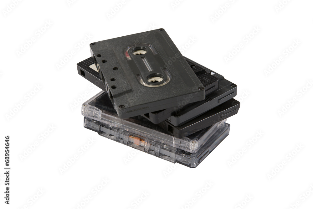 stack of compact cassettes isolated on white background stack of compact cassettes isolated on white background