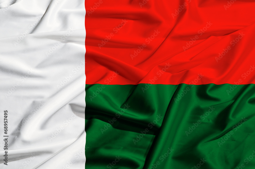 Obraz premium Madagascar flag on a silk drape waving