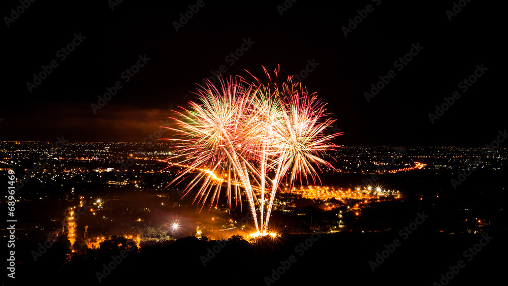 Fireworks in night cityscape.