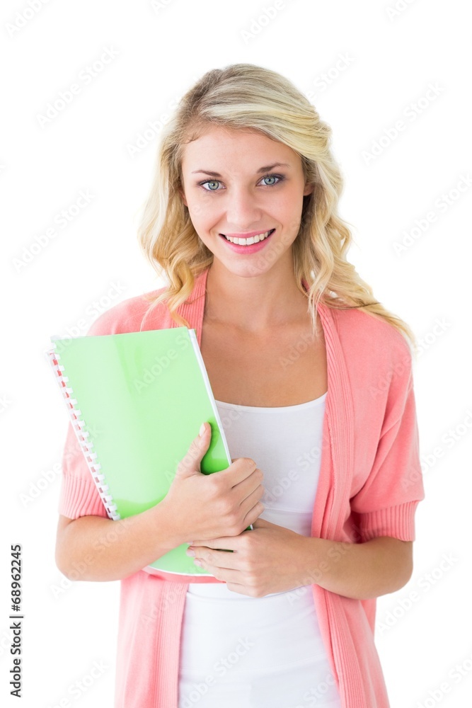 Attractive student smiling at camera