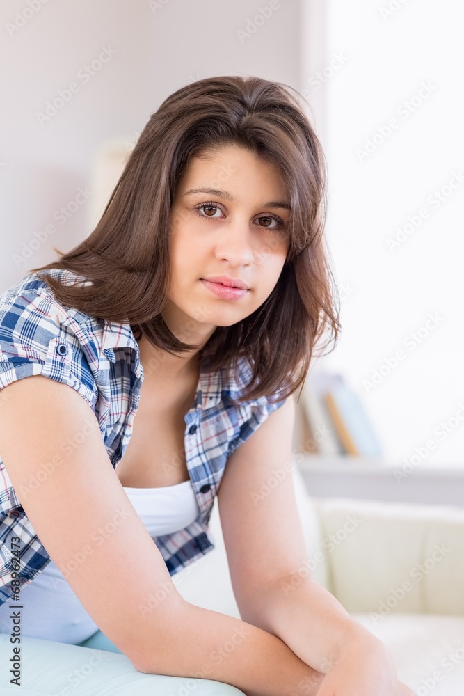Pretty brunette relaxing on the couch Pretty brunette relaxing on the couch