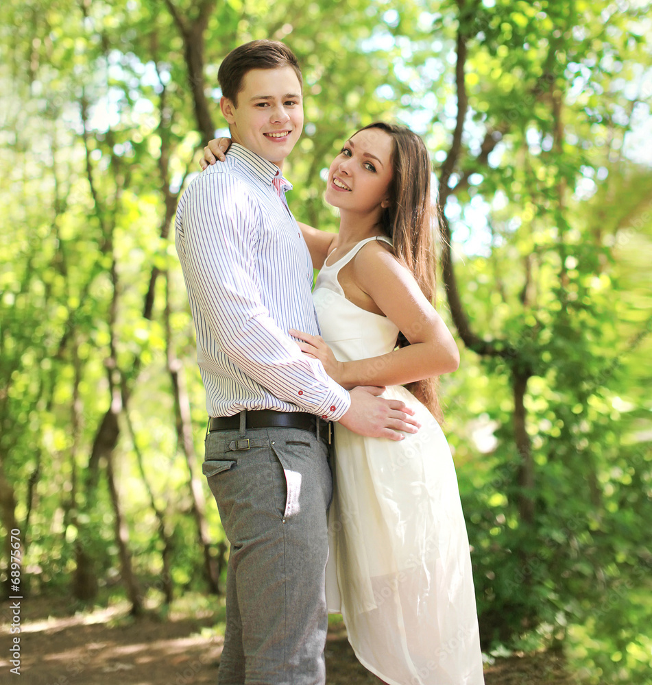 Pretty young couple in love enjoying summer time Pretty young couple in love enjoying summer time