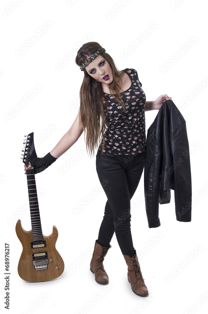 Beautiful young rocker girl dressed in black