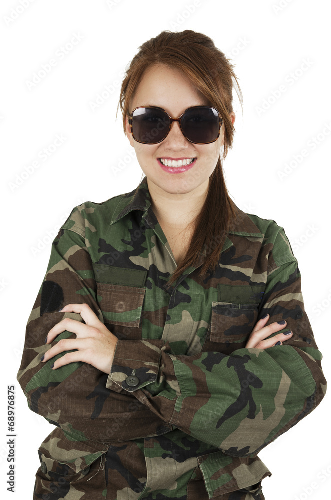 Pretty young girl dressed in green military uniform Pretty young girl dressed in green military uniform