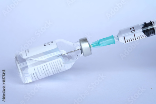 Vaccine and syringe photo