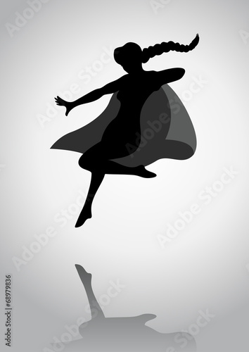 Silhouette of a female figure with superhero suit