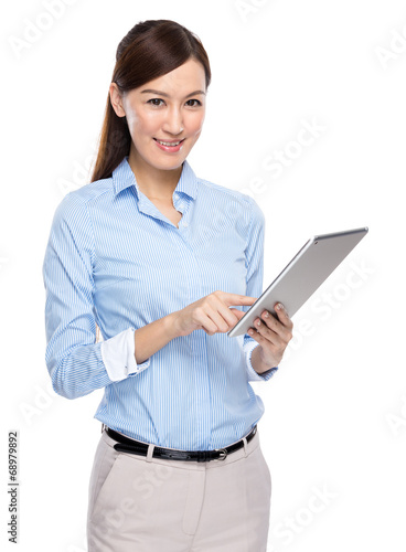 Businesswoman use of digital tablet © leungchopan