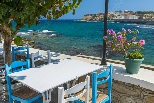 Fototapeta Naklejka Na Ścianę i Meble -  Tavern By The Sea in Greece